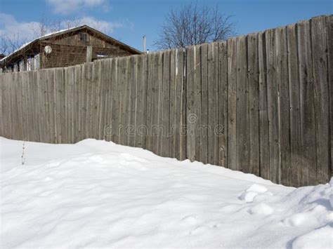 Old House Behind The High Wooden Fence In Winter Stock Photo Image Of