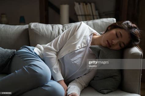 Tired Housewife Sleeping On The Sofa Photo Getty Images