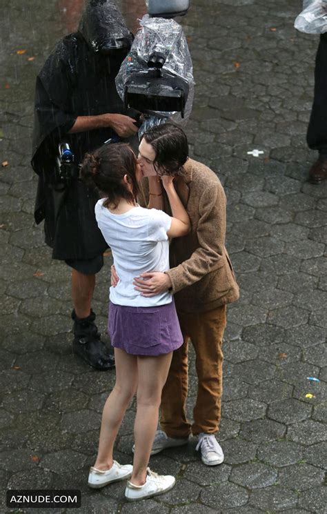 Selena Gomez And Timothee Chalamet Kissing During A Romantic Rainy