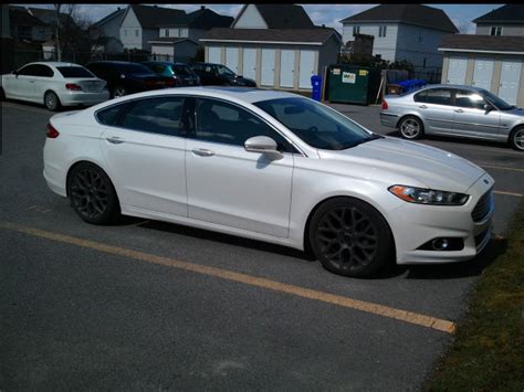 Silver Ford Fusion With Black Rims