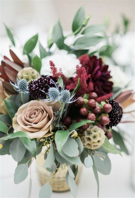 Fall burgundy flowers are a chic and elegant choice for fall weddings especially and a surprising color for your guests. Small low centerpiece, fall wedding with mauve and ...