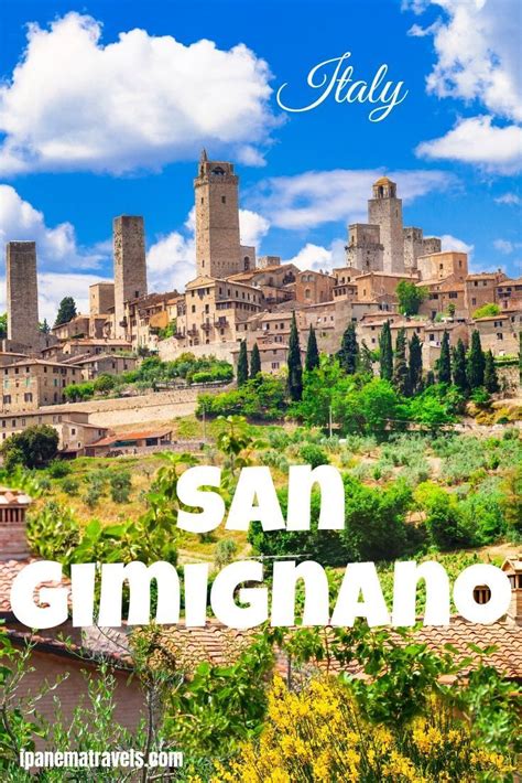 an italian village with the words san gimignianoo in front of it