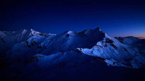 1366x768 Dark Blue Sky Above Snow Covered Mountain 1366x768 Resolution