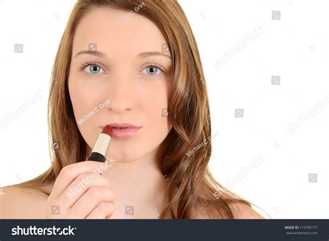 Teen Girl Putting On Red Lipstick Stock Photo 115783171 Shutterstock