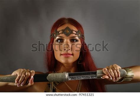 Young Warrior Woman Holding Sword Her Stock Photo 97451321 Shutterstock