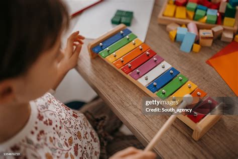 Little Girl Playing Xylophone High Res Stock Photo Getty Images