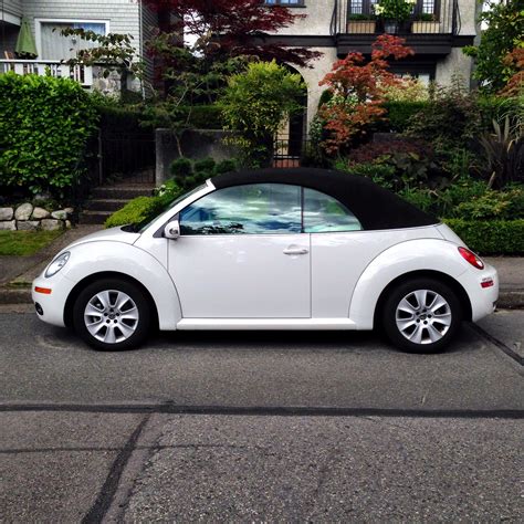 A Candy White New Vw Beetle Convertible Spotted In Kitsahlano