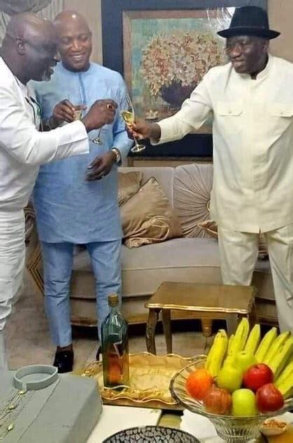 jonathan and apc s lyon celebrate with a bottle of red label photo ~ information guide africa