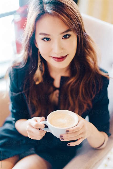 Beautiful Asian Woman Having Her Morning Coffee By Jessica Lia