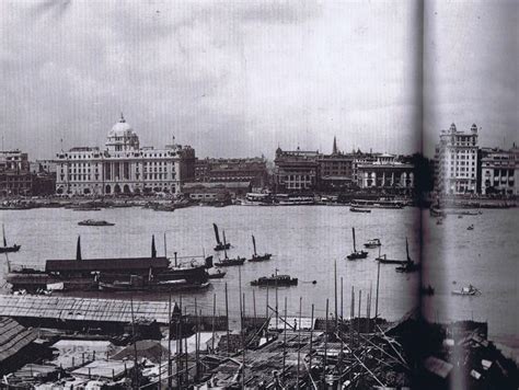 An Old Black And White Photo Of Boats In The Water