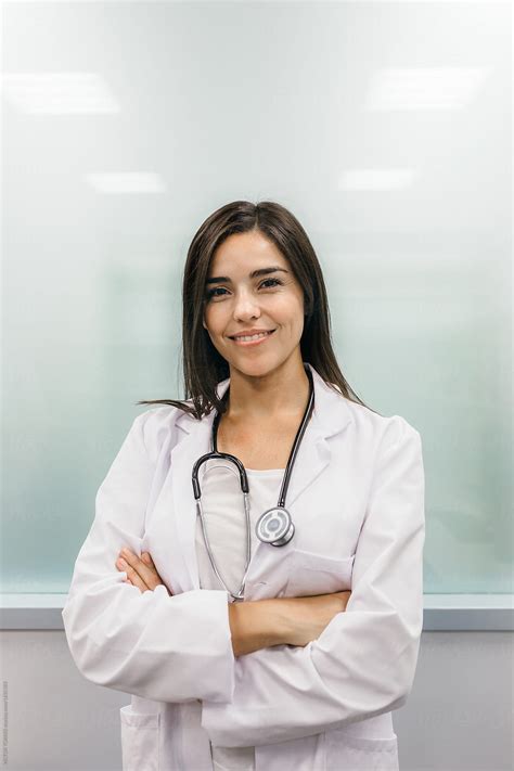 Smiling Woman Medic Portrait By Stocksy Contributor VICTOR TORRES Stocksy