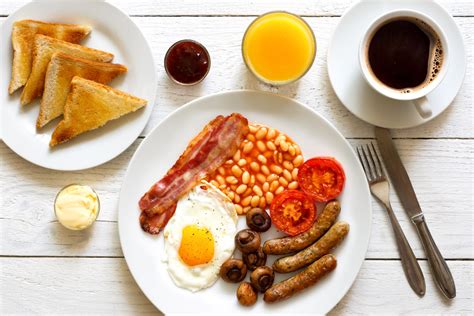 Traditional Fried English Breakfast With Orange Juice And Coffee From