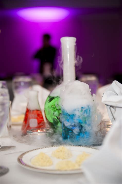 Chemistry Wedding Centerpieces Glassware Colored Water And Dry Ice