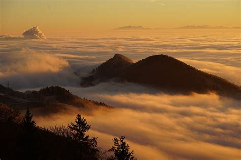 Brown Mountain Coated With Clouds During Sunrise Hd Wallpaper
