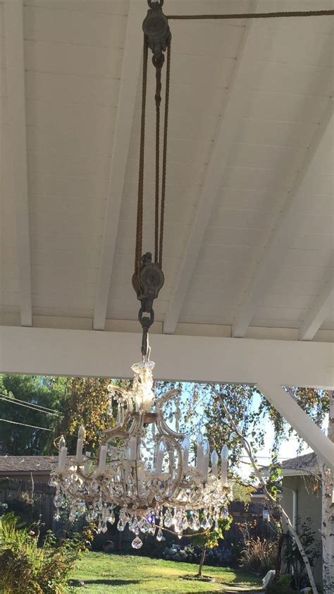 When looking for additional lighting outside of your home, there are several fixture possibilities to choose from. I used a old pulley I bought from a garage sale to hang ...