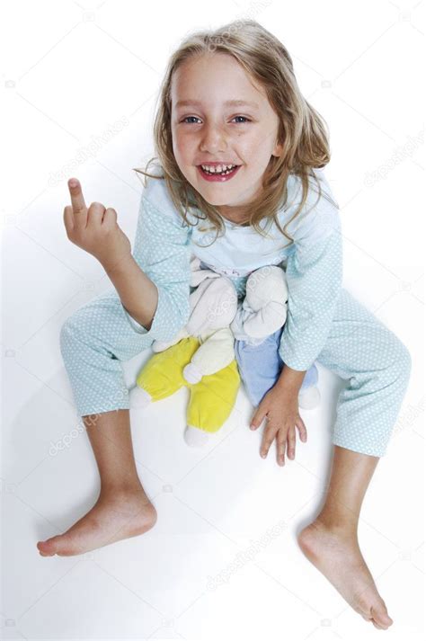 Girls In Pajamas Shows The Middle Finger Stock Photo Areadeposit