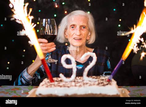 Senior Woman Toasting On Her Birthday Celebration Party Stock Photo Alamy