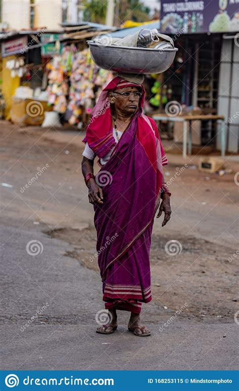 woman carries her load on her head editorial image image of asian poor 168253115