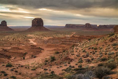 Dramatic And Iconic Western Landscape In Monument Valley During Sunrise