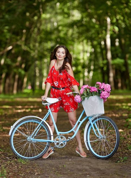 Premium Photo Beautiful Girl On Bike In Countryside