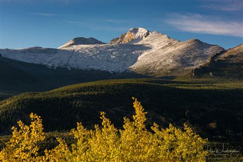 Snow Capped Longs Peak And Golden Aspen Trees Scenic Colorado