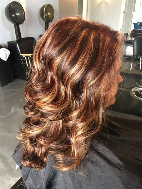 Highlights and lowlights are both great for adding dimension to your hair and making it appear thicker. Dark Brown Hair With Medium Brown Lowlights Red Hair With ...