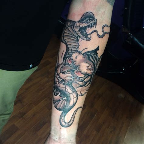 Let us create a custom design, tailored to your taste and anatomy. Tiger, snake tattoo, junior Garcia tattoo, Lancaster CA ...