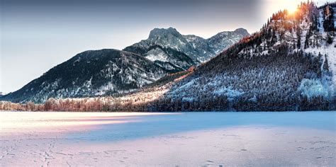 Brown And White Mountain Covered By Snow Under Sunset Hd Wallpaper