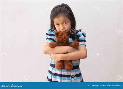 Asia Girl Hugging A Teddy Bear Stock Image Image Of Hugging T
