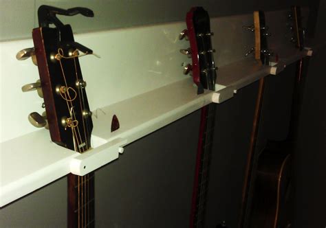 See more ideas about guitar, guitar hanger, guitar wall. DIY: 4-Guitar Wall Hanger. Cost: $15ish. FEATURED AS AN ...