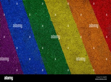 Rainbow Colored LGBT Pride Flag Painted On Asphalt Top View High