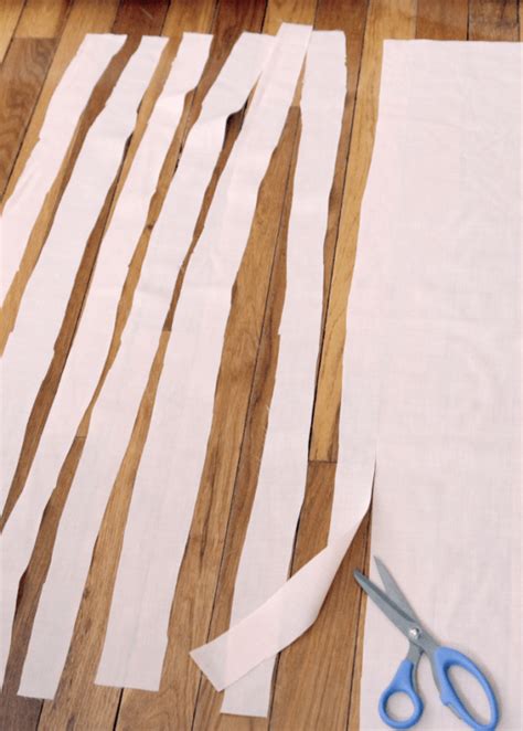 Make A Fabric Banner - Decor Fix in 2020 | Fabric banner, Fabric strip banner, Rag banner