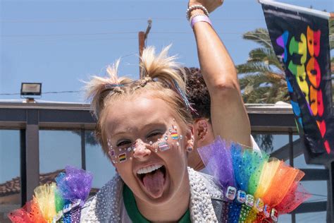 Jojo Siwa Sparkles For Weho Pride With Girlfriend In Rainbow Sneakers