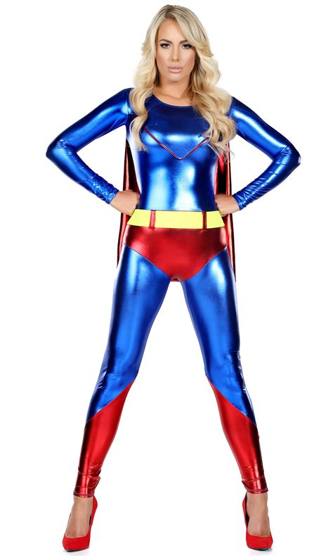 A Woman In A Blue And Red Costume Standing With Her Hands On Her Hipss