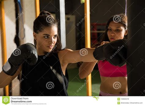 Pretty Woman Training In A Boxing Gym Stock Photo Image Of Coach