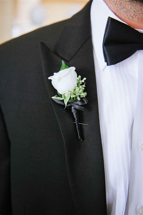 White Rose Boutonniere On Grooms Lapel