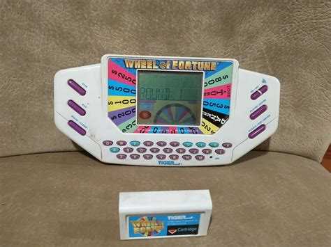 Tiger Wheel Of Fortune Vintage Handheld Electronic Game W Cartridge