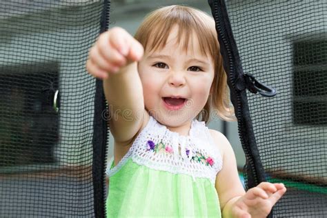 Close Up Of Toddler Girl On Her Trampoline Stock Image Image Of