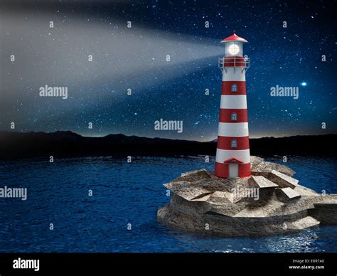 Lighthouse on the rock illuminating the darkness Stock Photo - Alamy
