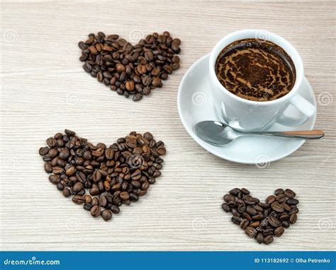 Cup Of Coffee Coffee Beans Hearts Stock Photo Image Of Brown