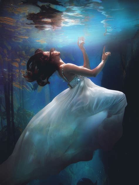 underwater photography of woman wearing white dress photo free underwater image on unsplash