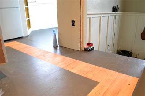 A painted wood floor properly painted with gaps between boards cleaned and filled (below) will be both historically significant and easy to care for. a home in the making: {renovate} how to paint a kitchen floor