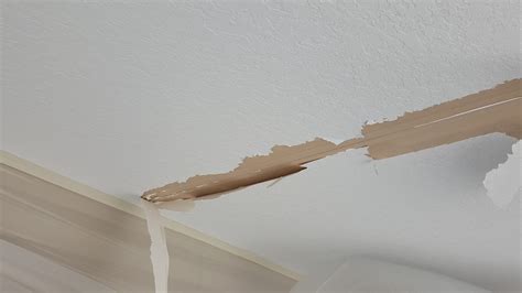 Remove any old drywall seam tape using a scraper and utility knife. Drywall Paper Tape Repair | Ocala | Marion County FL