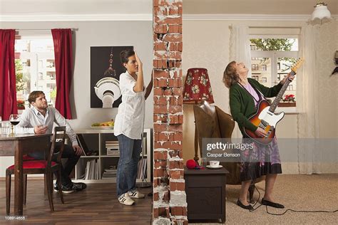 A Split Screen Showing An Angry Woman Pounding On The Wall To Her