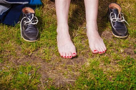 Beautiful Slim Female Feet On Green Grass Stock Image Image Of