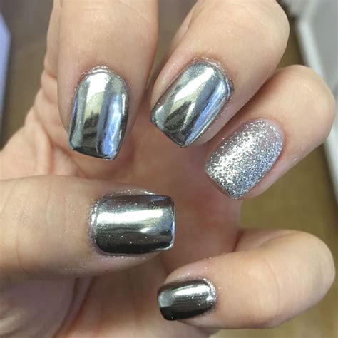 Silver Chrome Nails With Silver Glitter Accent Nail Prom Nails