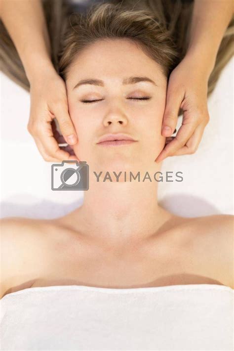 Yay Images Young Blond Woman Receiving A Head Massage In A Spa Center