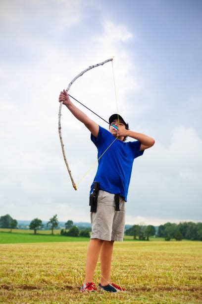 Make a diy bow and arrow! Kid With Homemade Bow And Arrow Stock Photos, Pictures & Royalty-Free Images - iStock