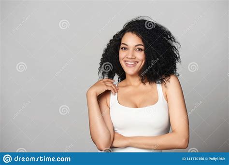 Relaxed Mixed Race African American Caucasian Woman Standing In
