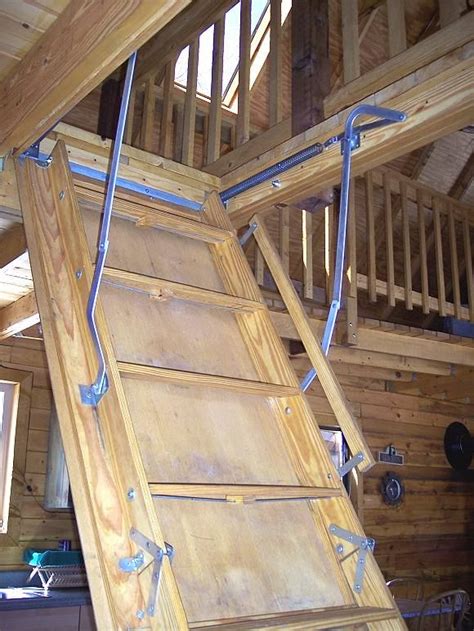 Pull down attic stairs residential steel spiral staircase kit. Pull-down ladder to the loft. Pretty cool. | Attic renovation, Attic stairs pull down, Attic rooms